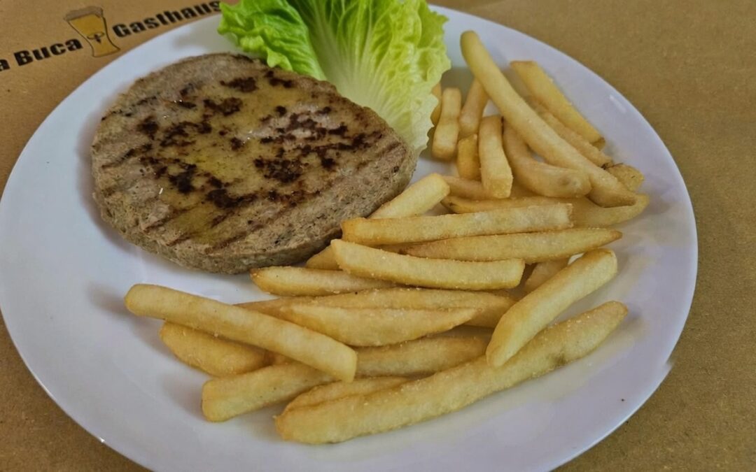 Burger di pollo grigliato al piatto